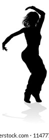 A woman street dance hip hop dancer in silhouette