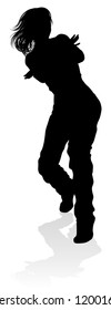 A woman street dance hip hop dancer in silhouette