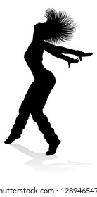 A woman street dance hip hop dancer in silhouette