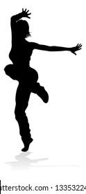 A woman street dance hip hop dancer in silhouette