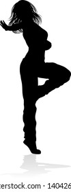 A woman street dance hip hop dancer in silhouette