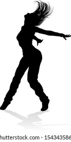 A woman street dance hip hop dancer in silhouette