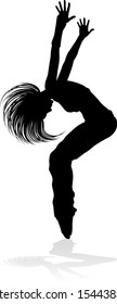 A woman street dance hip hop dancer in silhouette