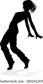 A woman street dance hip hop dancer in silhouette