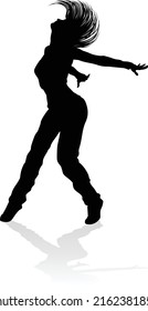 A woman street dance hip hop dancer in silhouette