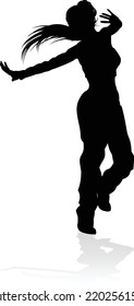 A woman street dance hip hop dancer in silhouette