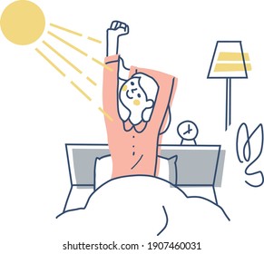 A woman stretching in bed while bathing in the morning sun