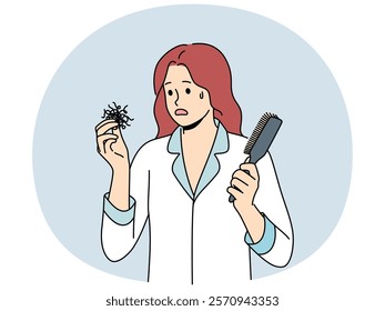 Woman suffering from baldness or hair loss problems holds comb and feels confused and needs help of doctor. Girl in pajamas saw hair falling out and thought about buying new shampoo.