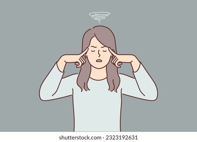 Woman suffers from dizziness and migraine caused by regular stress or lack of rest from work. Girl with dizziness feels discomfort due to hangover after alcohol party or corporate holiday