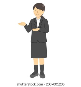 A woman in a suit doing a guide pose