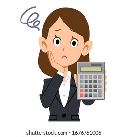 A woman in a suit worried with a calculator