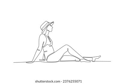 A woman sunbathing on the beach. Staycation one-line drawing