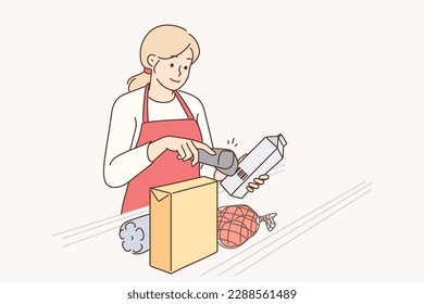 Woman supermarket cashier uses scanner to read barcodes on products of selected shop customers. Girl cashier stands near conveyor belt helping sellers to serve customers of grocery store 