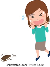 A woman surprised by a pest cockroach