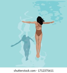 woman swimmer divin to the sea in summer season