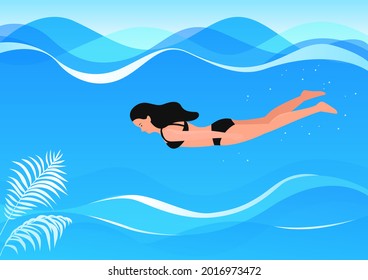 Woman swimming in tropical sea.
