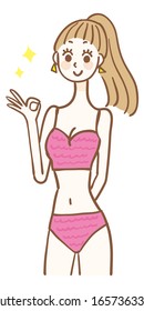 A woman in a swimsuit giving an OK sign