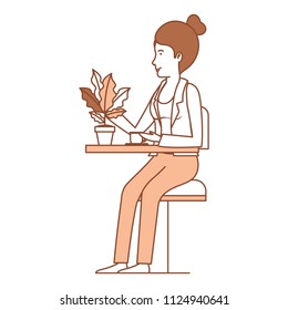 woman in the table drinking coffee with house plant