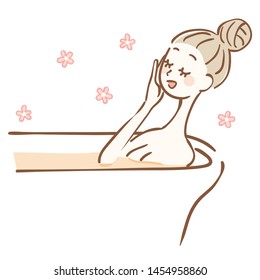 Woman taking a bath with bath salt