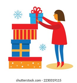 Woman taking gift box. Christmas concept with woman and christmas gifts