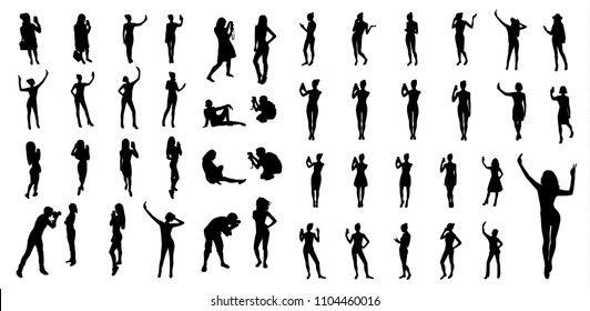 Woman taking photo silhouettes