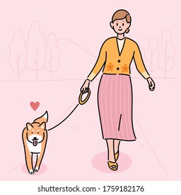 A woman is taking a walk with a dog. hand drawn style vector design illustrations. 