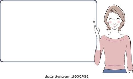 A woman talking about something with a white board