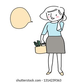 Woman talking on the phone during her grocery shopping. Cute woman talking on cell phone while picking up some groceries. Cheerful woman using mobile phone while she doing grocery shopping.