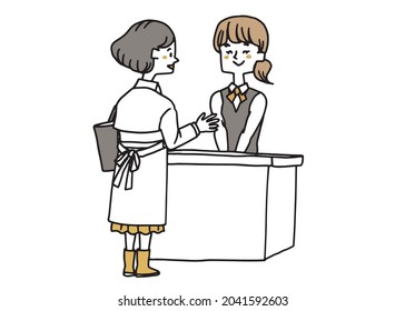  A woman talking to the receptionist