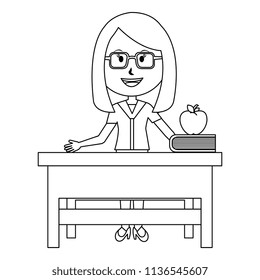 woman teacher in desk with apple and book