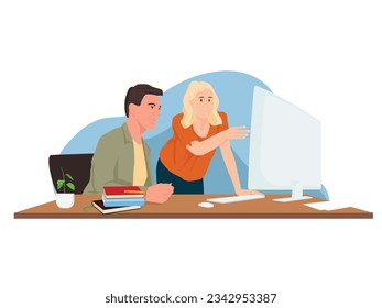 Woman teaching her colleague in the office on the computer.