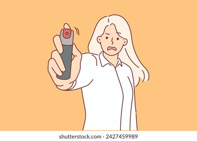 Woman threatens with pepper spray, feeling threatened or harassed by rapist violating personal boundaries. Girl holds pepper spray for self-defense and resists thief who wants to take money.