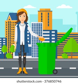 Woman throwing trash.