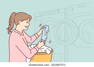 Woman throws dirty laundry into washing machine to make laundry fresh and smell good. Girl using laundromat stands with basket filled with soiled everyday things. Flat vector image