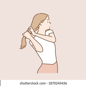 Woman tied her hair in a ponytail. Hand drawn style vector design illustrations.