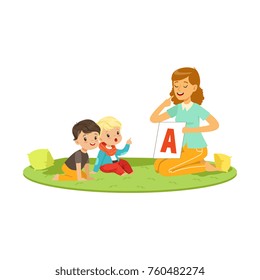 Woman with toddlers sitting on round carpet and playing in educational game for speech development. Flat people characters