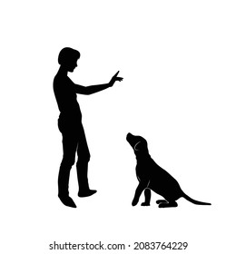woman training a dog basic commands silhouette. Girl and pet puppy. Vector silhouette of a woman with a dog.