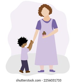 A woman treats a child with a delicious cupcake. White girl and black child with sweets.