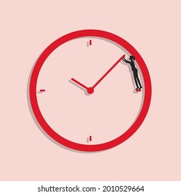 Woman tries to turn back time. Businesswoman stands into clock face and pushes back clock hand. Business deadline concept.