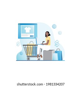 Woman with trolley in online store on website chooses clothes, buys goods on laptop, places order on Internet. Contactless payment in laptop. Delivery of purchases in paper bags.