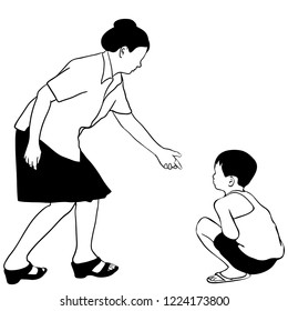 The woman is trying to help the boy to stand up. 