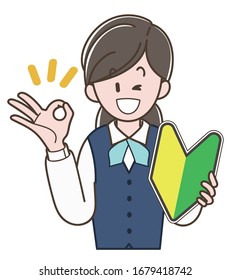A woman in a uniform holding the beginner mark