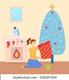 Woman unpacking gifts on Christmas holiday vector. Girl at home sitting on floor by pine tree with baubles. Fireplace with socks and candy sticks. Snowman statue traditional symbols of xmas new year