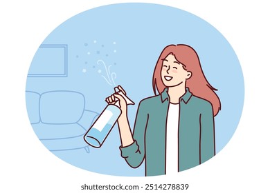 Woman uses air freshener to get rid of unpleasant smell in apartment after cleaning. Housewife girl stands in living room with air freshener spraying fragrance to create comfortable environment