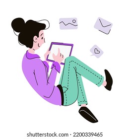 A woman uses a tablet. The concept of working online through gadgets
