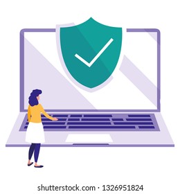 woman using laptop computer with shield