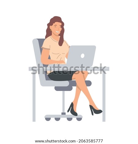 woman using laptop in workplace