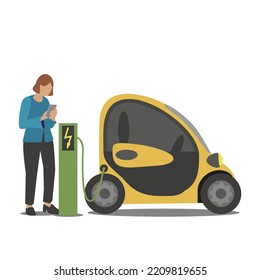 Woman using a mobile app to monitor the charging of her electric car.