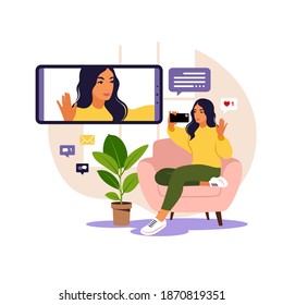 Woman using phone for collective virtual meeting and group video conference. Woman chatting with friends online. Video conference, remote work, technology concept.