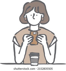 Frau benutzt Smartphone im Café